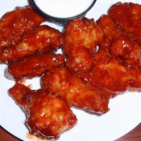 1 Lb Regular Wings · Served with a side of ranch dressing.