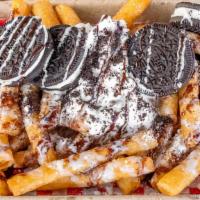 Oreo Dream Funnel Cake Fries · Our Funnel Cake Fries, covered in powdered sugar, topped with Mega Stuffed Oreos, Oreo crumb...
