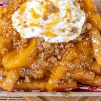 Apple Pie Funnel Cake Fries · Our Funnel Cake Fries, covered in powdered sugar, tossed in cinnamon sugar, topped with appl...