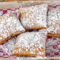 4Pc Beignets · New Orleans Style Beignets deep fried and dusted in powdered sugar.