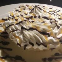 Banana Cream Pie · Delicious tart filled with Parisian cream, sliced bananas & whipped cream, then topped with ...