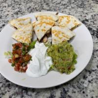 Quesadilla · Classic Quesadillas ( Beef, Chicken Or Portobello Mushroom) Choice of 1 Side
