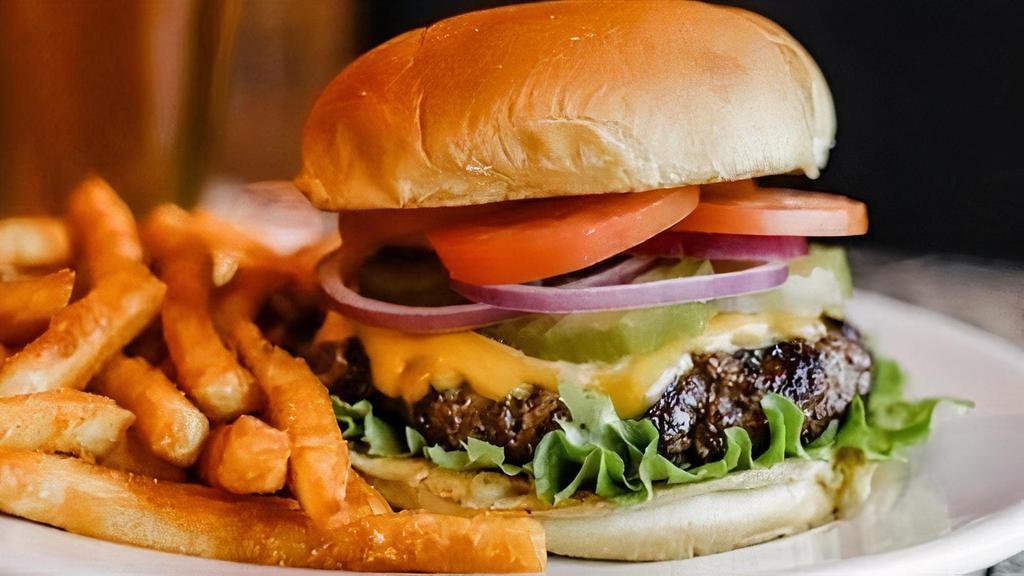 8 Oz  All Beef Cheese Burger · 8 oz All Beef Cheese Burger and you can add all kinds of burger toppings to customize your burger how you want it.