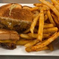 Pulled Pork Sandwich · A Stacked Grilled Cheese With Smoked Pulled Pork, Tossed In BBQ Sauce And Your Choice of Che...