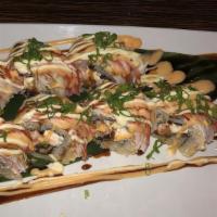 Viper Roll (Cooked) · Smoked salmon, eel and cream cheese, topped with crab sticks, with eel sauce, and spicy mayo.