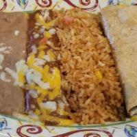 #5 · Two crispy beef tacos, Mexican rice and refried beans.