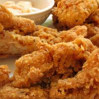 Alley Catfish Basket - · US farm raised catfish tenders, marinated and coated with our special seasoning blend then c...