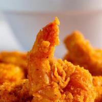 Shrimp Trap Basket - · 8 Jumbo Fried Shrimp, cooked golden brown.  Served with hot sea salted fries, hush puppies a...