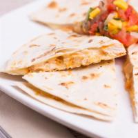 Quesadilla Platter · Mozzarella cheese melted between two tortillas. Sprinkled with tomatoes and cotija cheese.