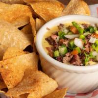 Hoot And Hooty'S Queso With Brisket · Smoked bacon and roasted pepper queso with the addition of our smoked prime chopped brisket,...