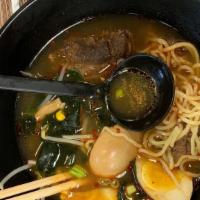 Spicy Beef · Spicy. Spicy soy mixed broth add slices roasted BBQ beef with boiled egg, bean sprout, cabba...