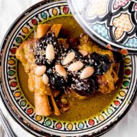Lamb Shank With Prunes · Most popular. Gluten-free. Braised in typical spices and onions with almonds, sesame seeds, ...