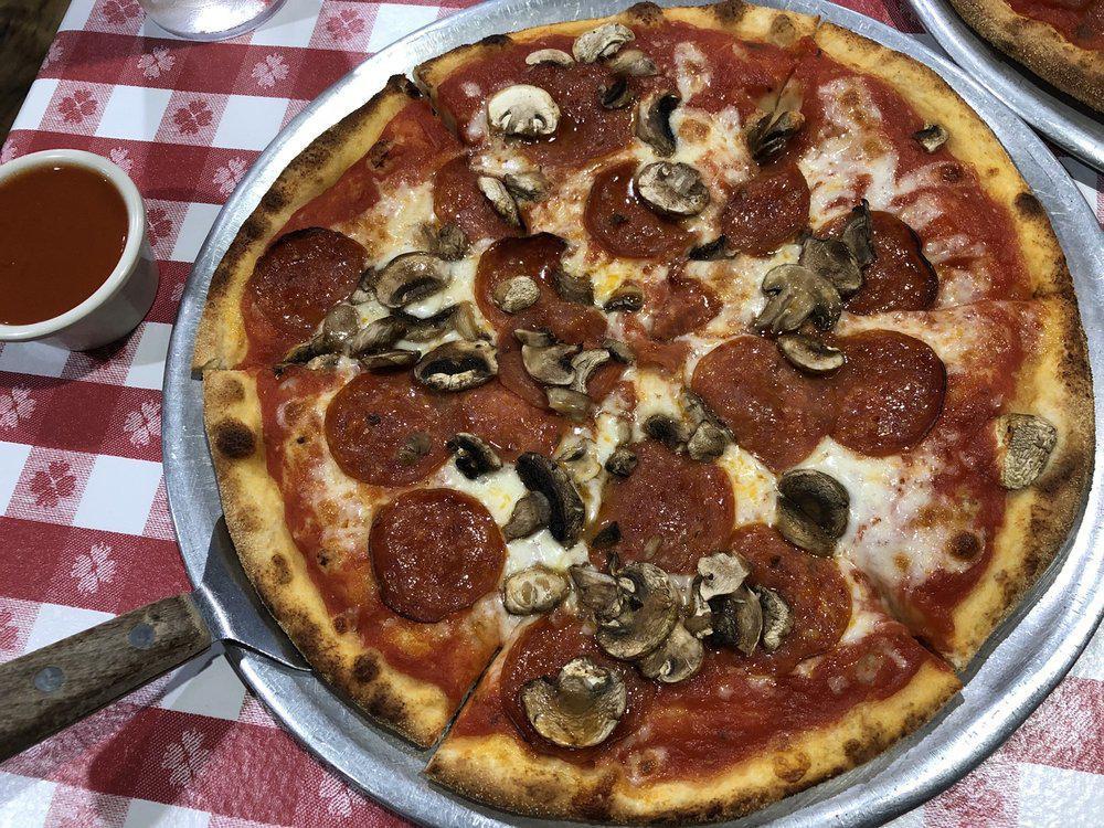 Carmine's Pizza Kitchen · Italian · Salad · Pizza