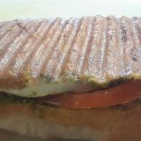 Grilled Caprese · Mozzarella, sliced tomatoes, basil and pesto on a grand central “ciabatta”roll. Includes mac...