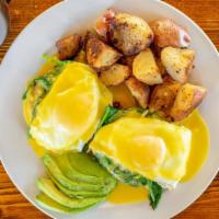 California Benedict · English muffin topped with grilled tomato, avocado, spinach, poached eggs and hollandaise.