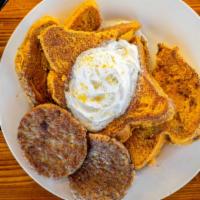 Captain Crunch French Toast · Cinnamon swirl Texas toast coated in captain crunch and grilled to perfection! Served with b...