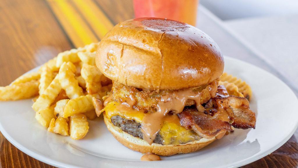 Bbq Bacon Cheeseburger · Served with apple-wood smoked bacon, onion rings, cheddar cheese and BBQ mayo on a brioche bun.