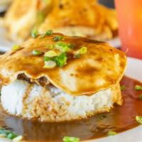 Loco Moco · Steamed white rice topped with an Angus patty, 2 eggs any style, brown gravy and green onions.