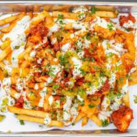 Chicken Loaded Fries · Spicy. Fried chicken on top of French fries with cheese sauce, pickles, hot sauce and cilant...