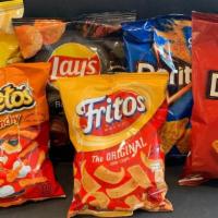 Lay'S Chips · Assorted variety single serve bags.