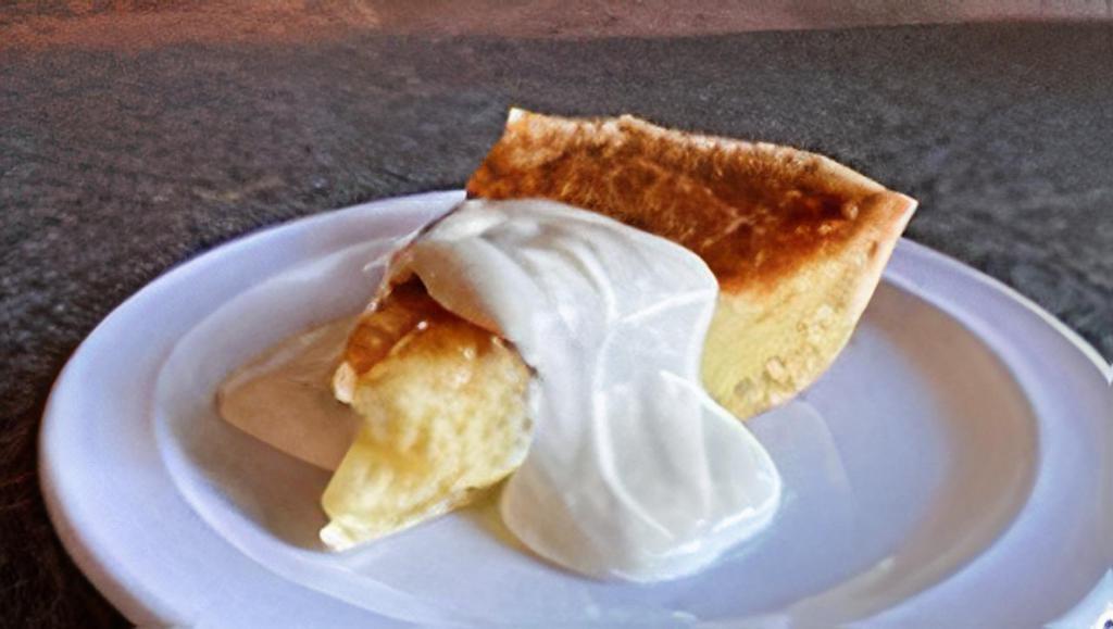 Buttermilk Pie · with Sour Cream Sauce