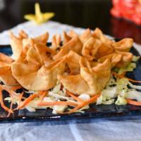 Fried Crab Cheese Wontons (8) · Crispy wontons filled with a creamy mix of crab meat, green onion and a hint of dijon mustard.