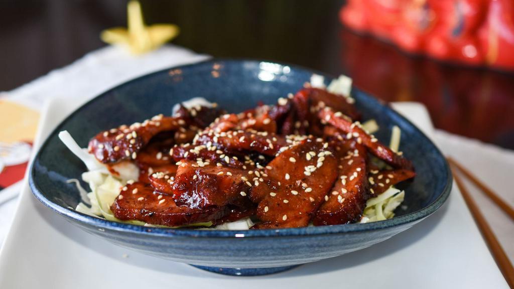 Chinatown Style Barbecue Pork · Sliced traditional Chinese BBQ pork served with hoisin-honey glaze.