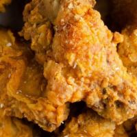 Fried Chicken Wings (6) · Lightly breaded and fried to crispy perfection with a side of sweet red chili sauce. It’s ad...