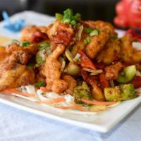 Salt & Pepper · Spicy. Flash fried chicken shrimp or tofu, tossed with red chili peppers, scallions, ginger ...