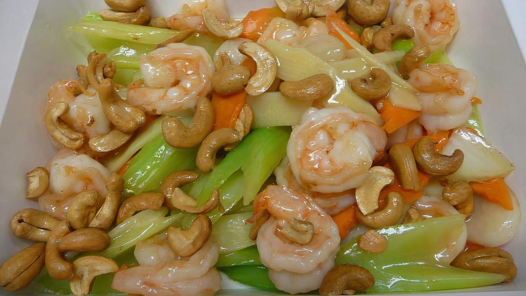 Cashew · Wok-seared with celery and carrots,  with honey glazed cashews. Served in a light brown sauce.