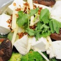 Tofu Rice Soup · Thai-style ginger rice soup with soft tofu, shiitake mushrooms, seasonal vegetables, and gin...