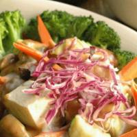 Bangkok Café Bathing Rama · Soft tofu, spinach and seasonal vegetables, with caramelized onions & mushrooms and fresh be...