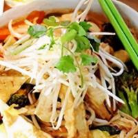 Araya'S Noodle Soup · Wide/thin rice noodles cooked in lime dressing and tom yum paste, clear broth, fried tofu an...
