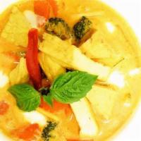 Red Curry · Soft tofu with seasonal vegetables, bamboo shoots, bell peppers. Cooked in red curry, topped...