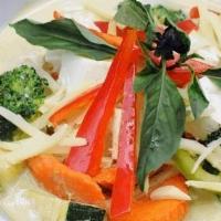 Green Curry · Soft tofu with seasonal vegetables, bamboo shoots, bell peppers. Cooked with green curry, to...