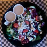 Greek Salad  · romaine, kalamata olives, cucumbers, radicchio, cherry tomatoes & feta