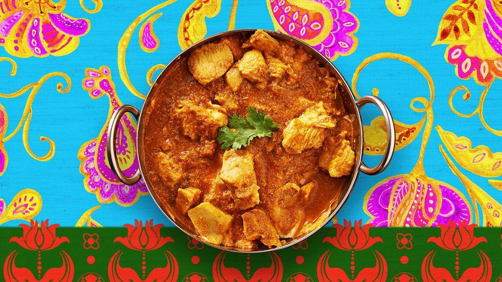 Butter Chicken · Boneless tandoori chicken cooked in a tomato and butter sauce.