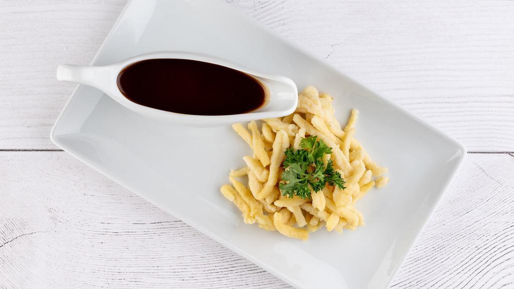 Spaetzle With Gravy · Our favorite traditional side dish to a perfect Schnitzel. Handmade in our kitchen from scratch!