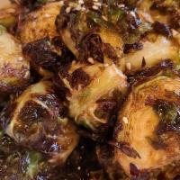 Brussels Sprouts · Sautéed Brussels sprouts in citrus soy miso sauce.
