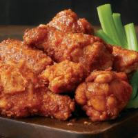 Kookaburra Wings® · Chicken wings tossed in our secret spices served with our Blue Cheese dressing and celery. C...