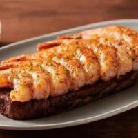 Grilled Shrimp On The Barbie · Seasoned with a special blend of herbs and spices then flame grilled. Served with Outback’s ...