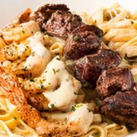 New! Kingsland Pasta · A steakhouse twist on your favorite Queensland Pasta. Grilled steak and shrimp over fettucci...