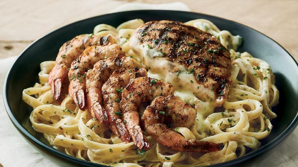 Queensland Chicken & Shrimp Pasta · Grilled chicken and shrimp and fettuccine noodles tossed in a bold Alfredo sauce