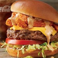 The Bloomin' Burger®* · Topped with Bloomin’ Onion® petals, American cheese, lettuce, tomato, house-made pickles, on...
