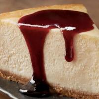 New York-Style Cheesecake · Aussie-sized slice of premium New York-style cheesecake served with a choice of raspberry or...