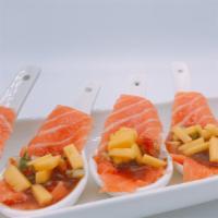 New Style Salmon Sashimi · Salmon mix with mango cucumber, onion, bell pepper with chef special sauce.