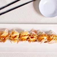 Shaggy Dog Roll · Shrimp tempura, crab meat on topped, with eel sauce, and spicy mayo.