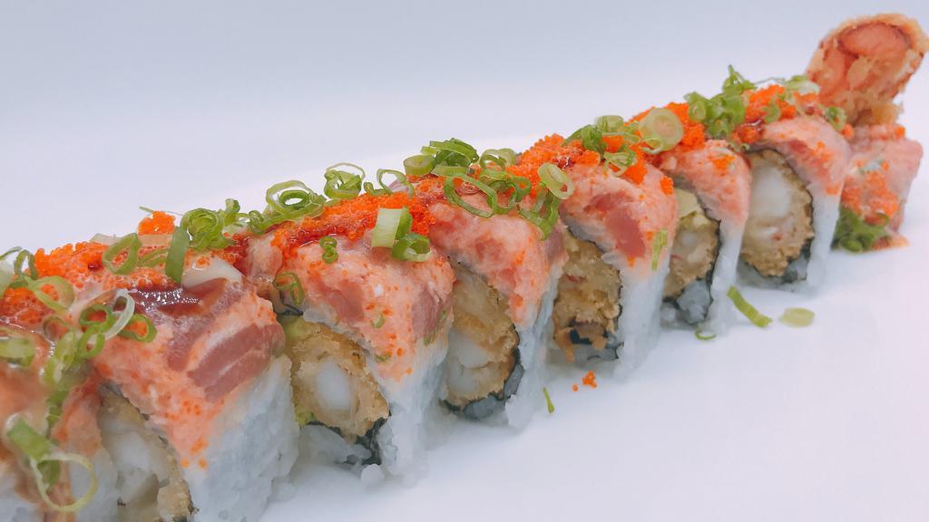 Fancy Lobster Roll · Lobster tempura and avocado inside spicy tuna, tobiko on top with mango sauce.