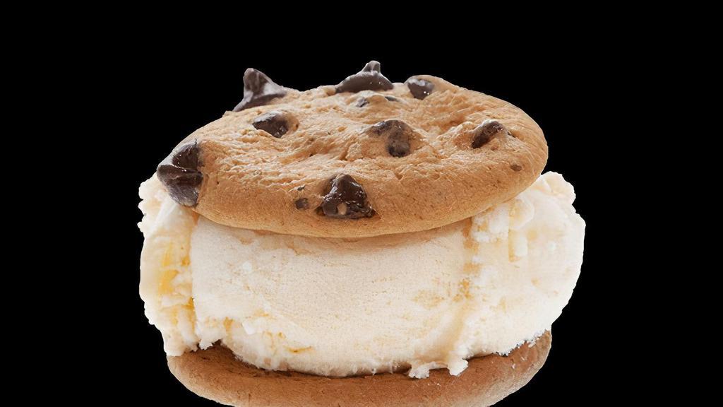 Mini Ice Cream Sandwich · Our famous made-to-order ice cream sandwiches also come in a mini size! Pick your favorite flavor of ice cream and we will add two of our freshly-baked mini chocolate chip cookies.
