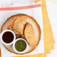 Vegetable Samosa (2 Pc) · Vegan. Indian pastry fill with potatoes peas and spices, served with mint chutney and tamari...